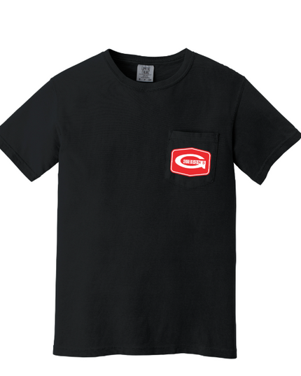 A black short-sleeve crewneck pocket t-shirt with a red and white 'Cruelty Free' chest patch, displayed on a clean white background.