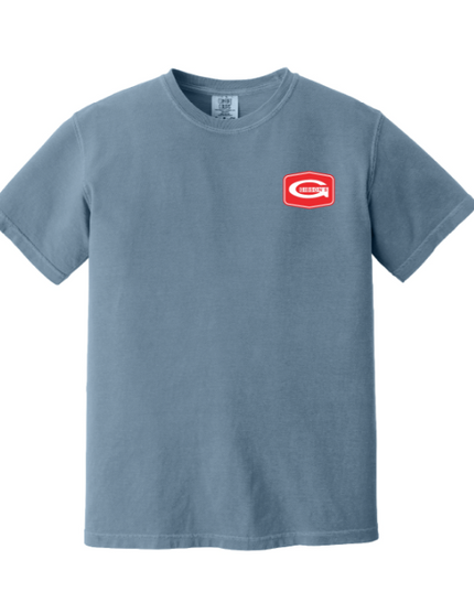 A slate blue short-sleeve crewneck t-shirt with a small red and white embroidered logo on the left chest, displayed on a clean white background.